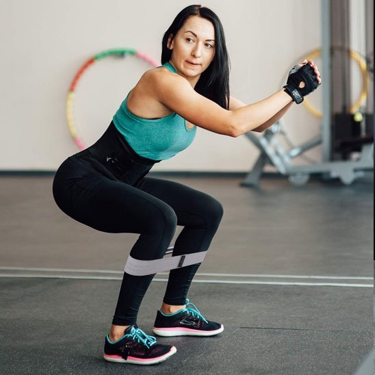 Élastique musculation squats