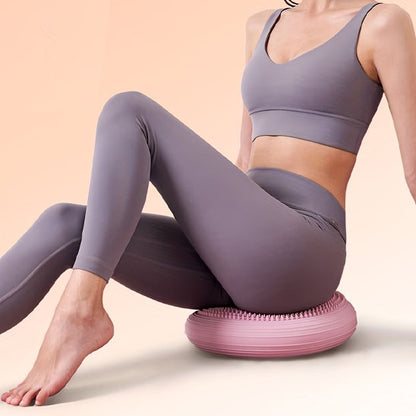 fille assise sur tapis pilates rose tapis du sport