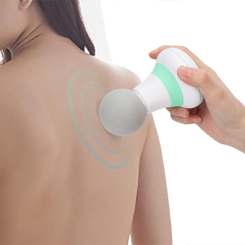 pistolet de massage blanc sur dos appareil de massage